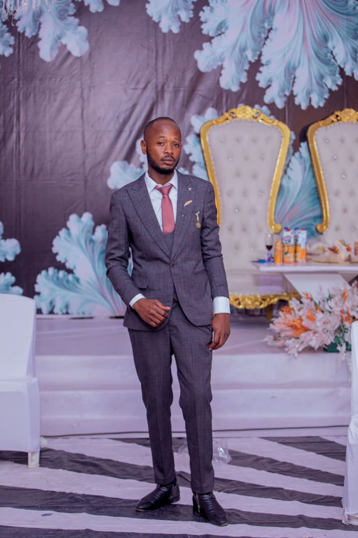 Groom portrait by Red Fox Studios